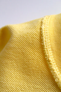 oversized raw-edge sweatshirt - optimist yellow - Commun des Mortels